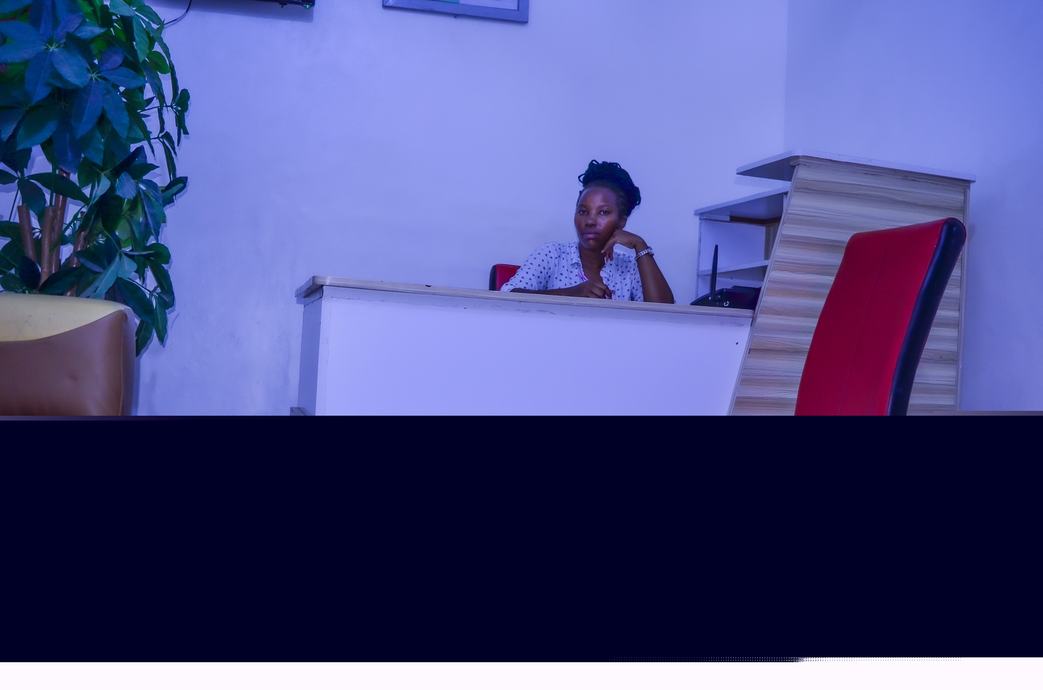 Bright corridor with plants at Kilimanjaro Guest House Lodwar